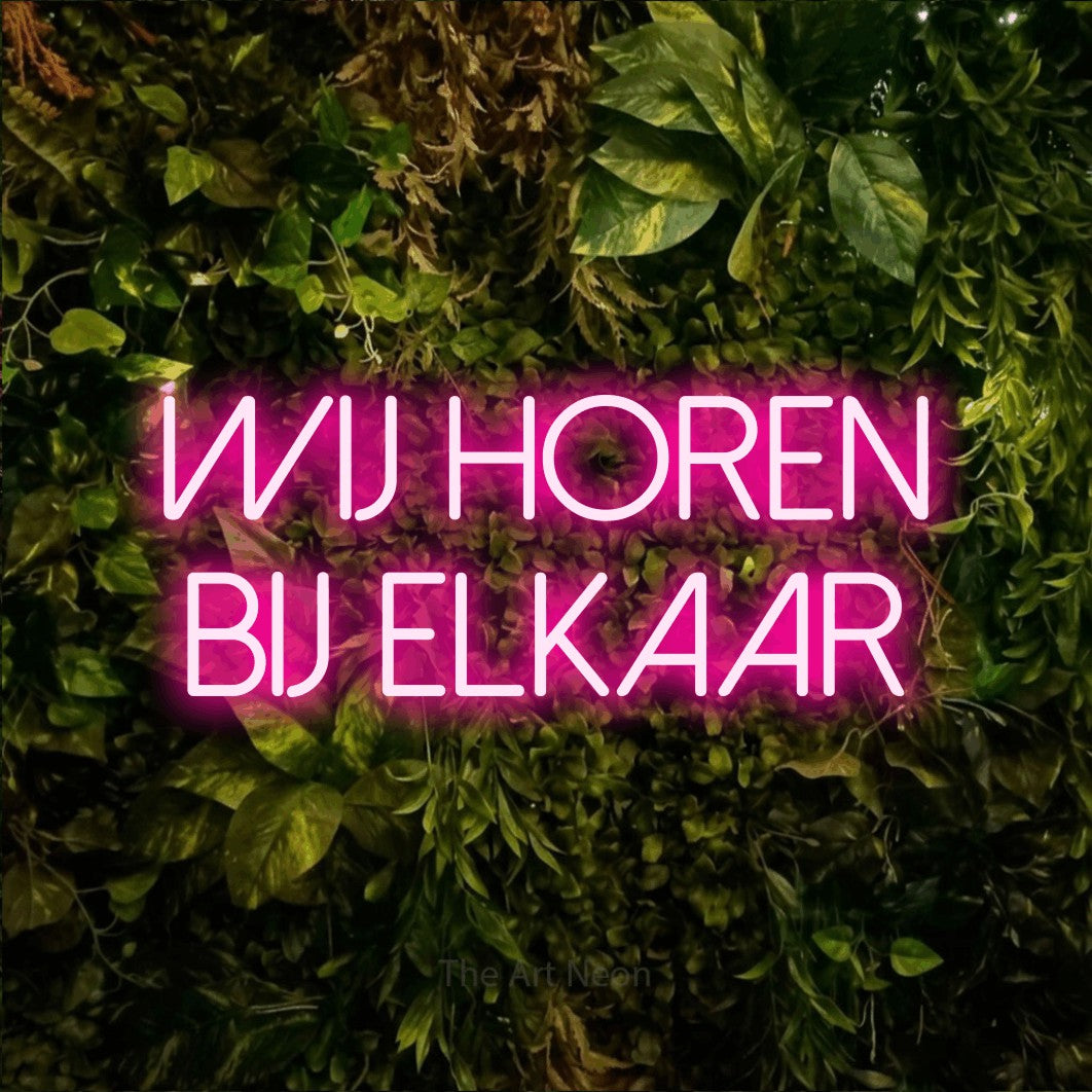 LED neon sign reading “WIJ HOREN BIJ ELKAAR”, arranged in 2 lines.