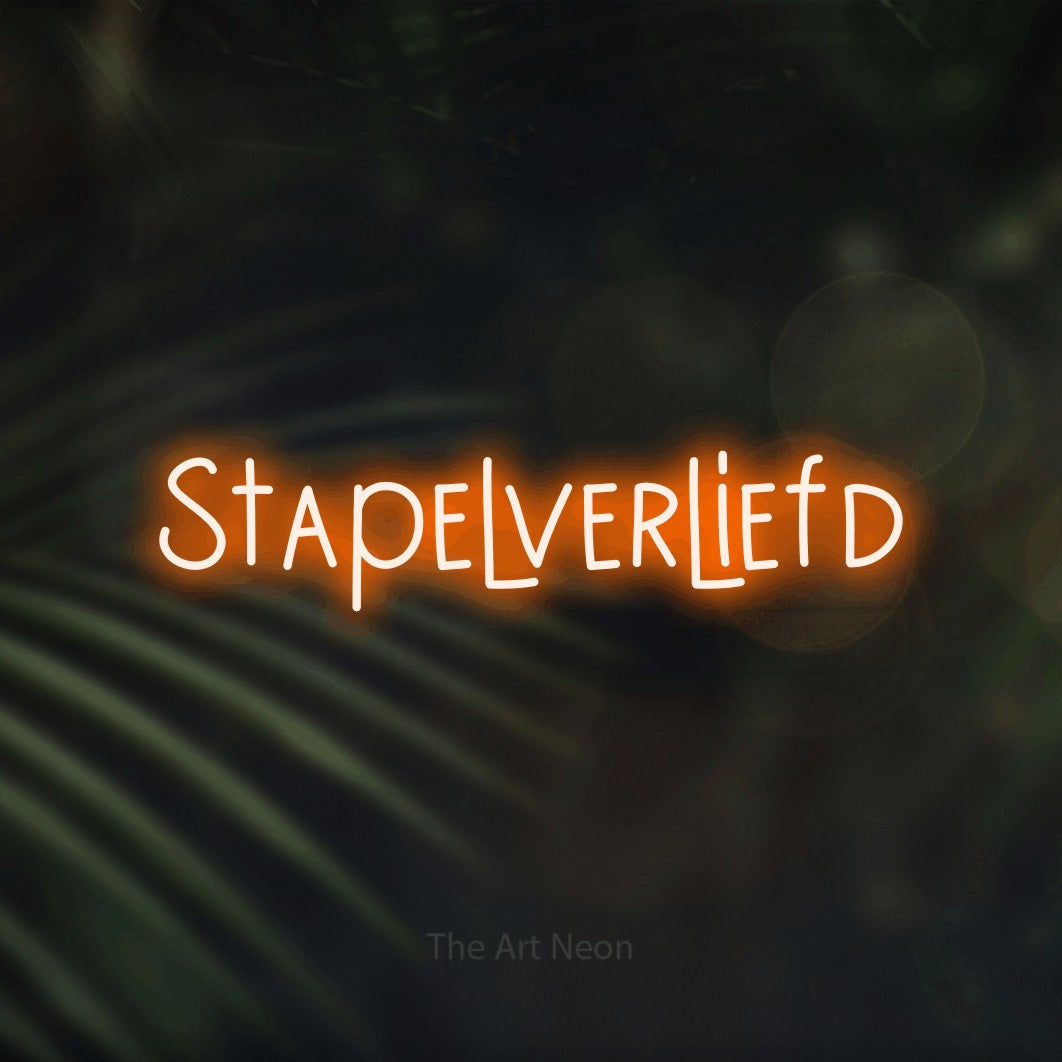 LED neon sign reading “Stapelverliefd”, arranged in a single line.