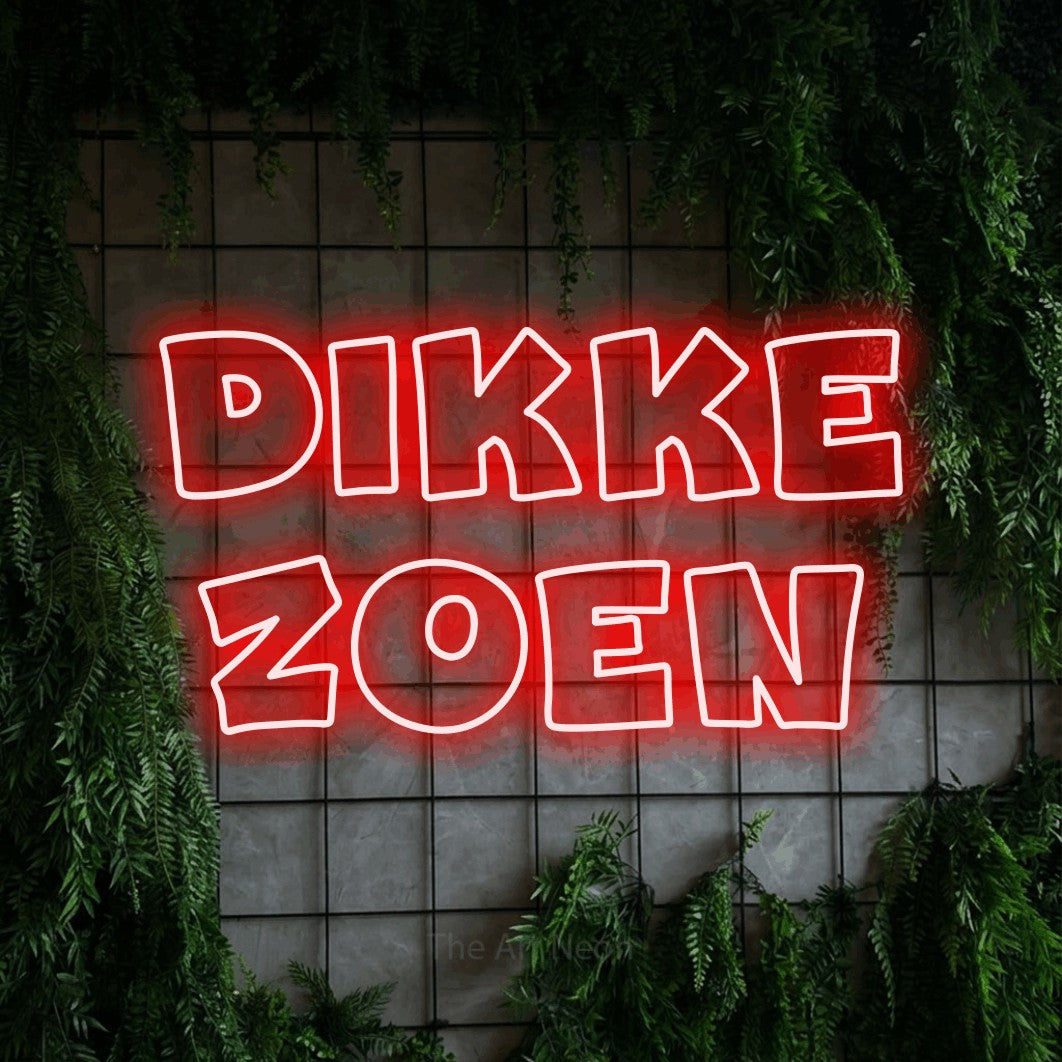 LED neon sign reading “dikke zoen”, arranged in 2 lines.