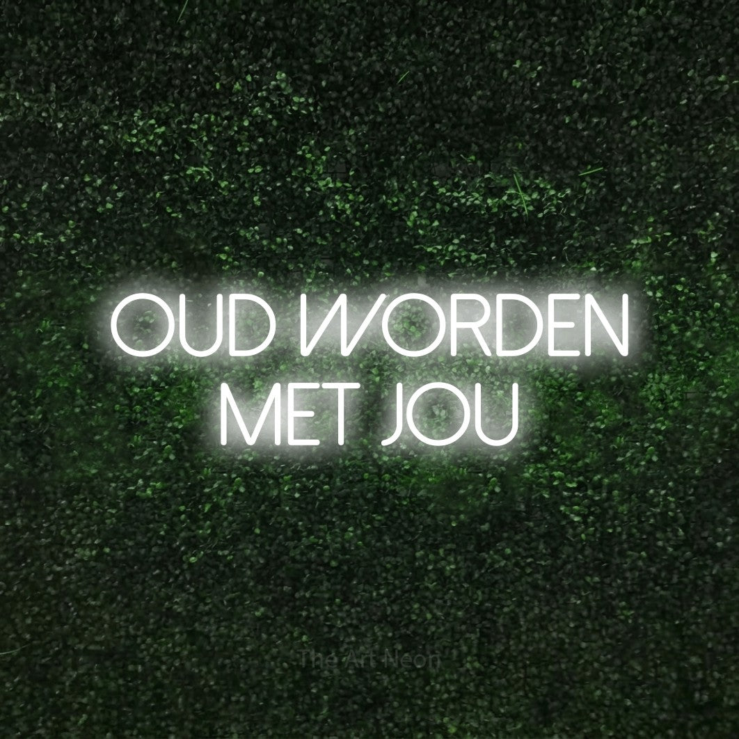 LED neon sign reading “OUD WORDEN MET JOU”, arranged in 2 lines.