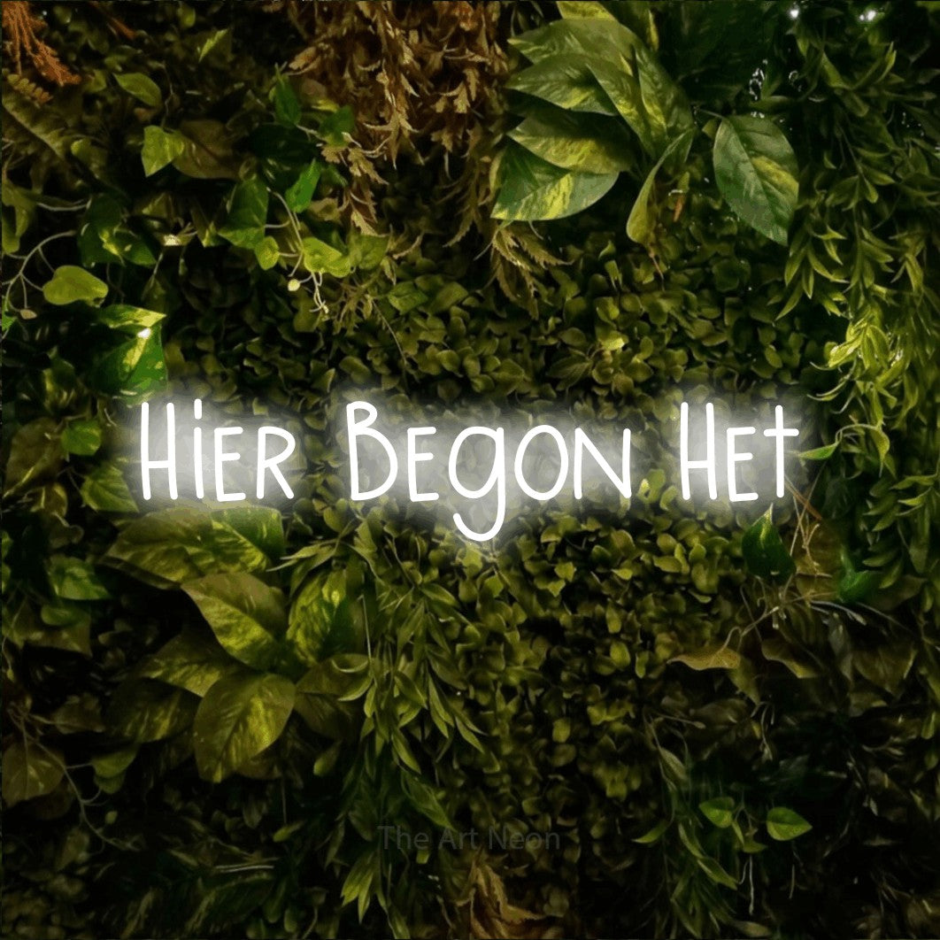 LED neon sign reading “Hier Begon Het”, arranged in a single line.