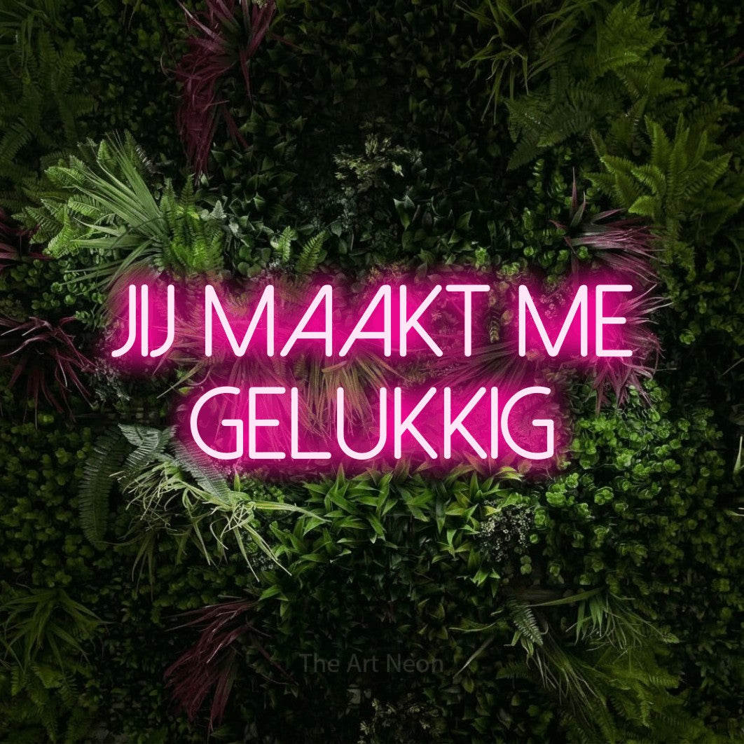 LED neon sign reading “jij maakt me gelukkig”, arranged in 2 lines.