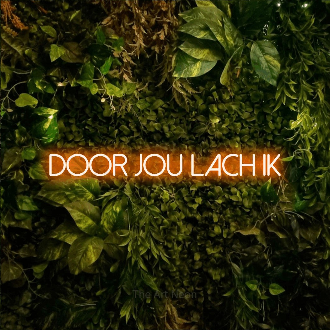 LED neon sign reading “DOOR jou lach ik”, arranged in a single line.