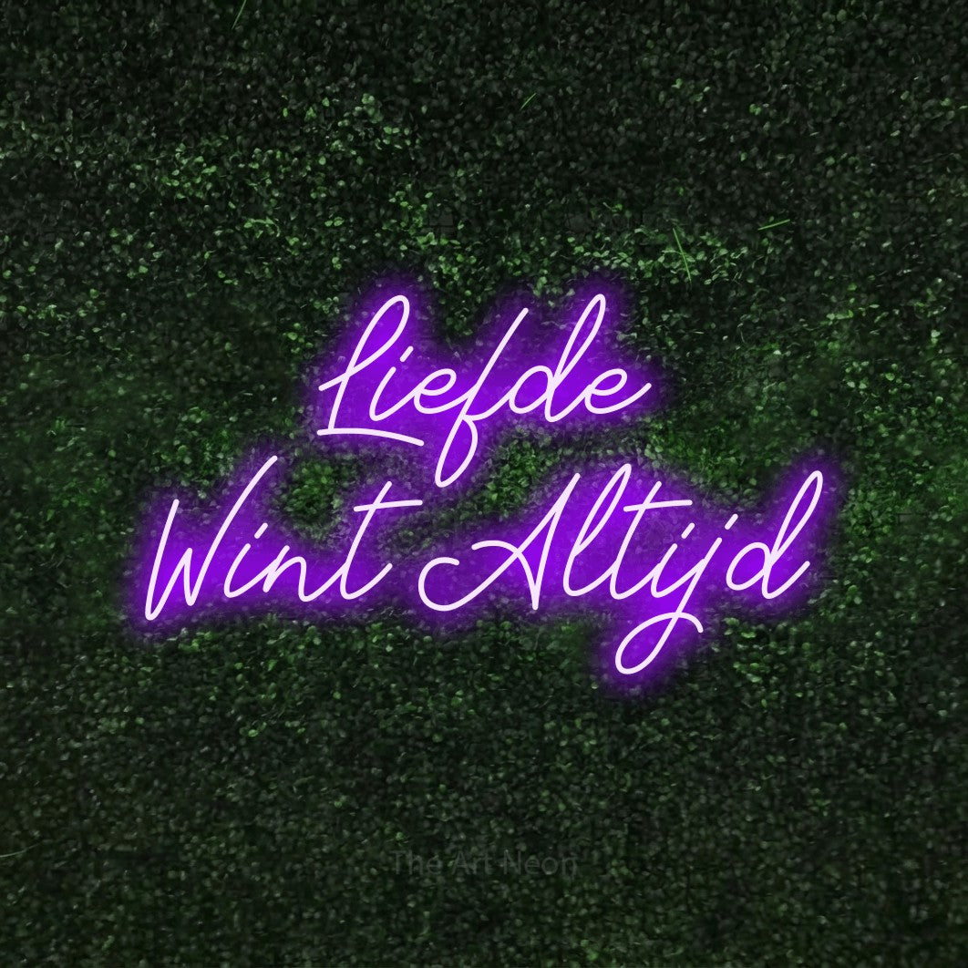 LED neon sign reading “Liefde Wint Altijd”, arranged in 2 lines.