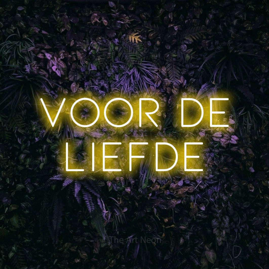 LED neon sign reading “Voor De Liefde”, arranged in 2 lines.