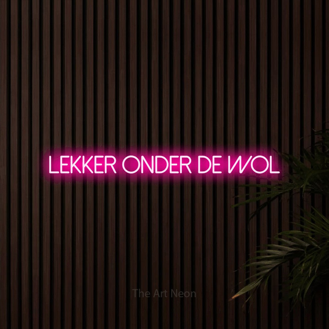 LED neon sign reading “lekker onder de wol”, arranged in a single line.