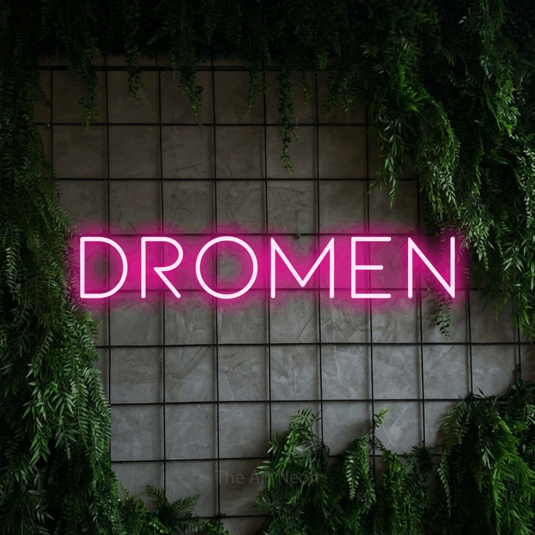 LED neon sign reading “DROMEN”, arranged in a single line.