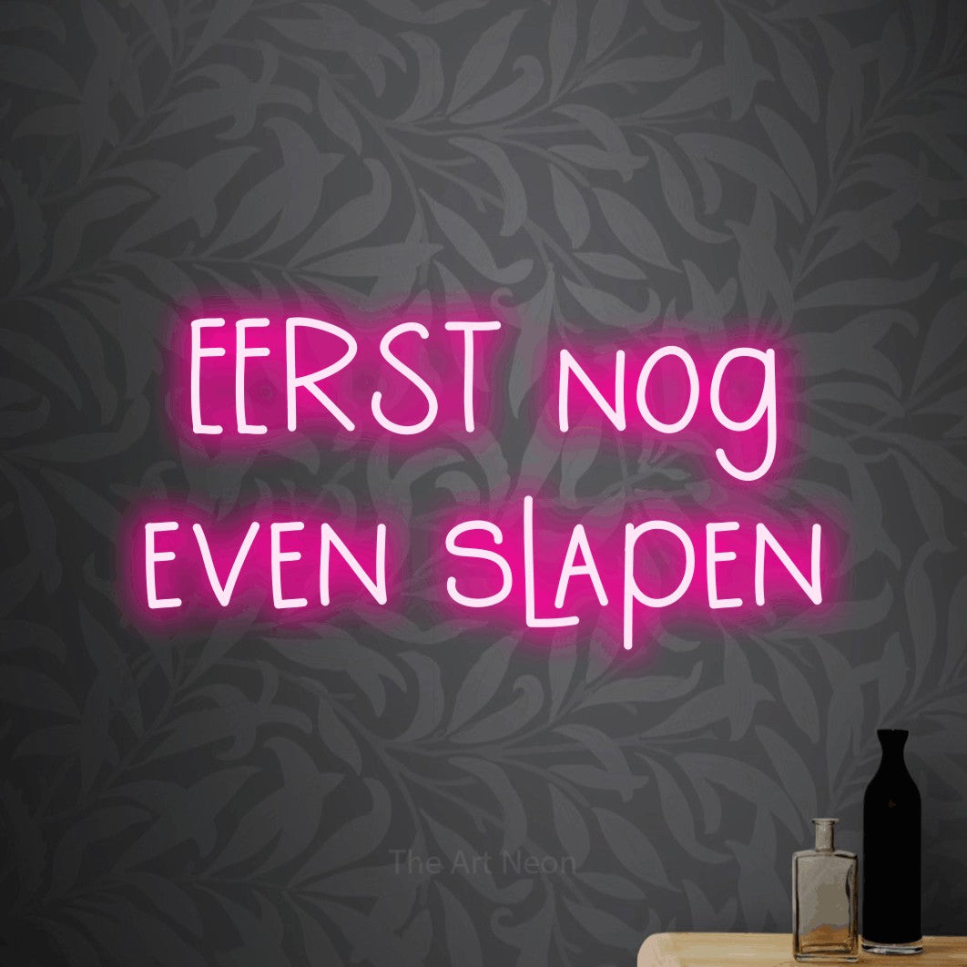 LED neon sign reading “EERST nog even slapen”, arranged in 2 lines.