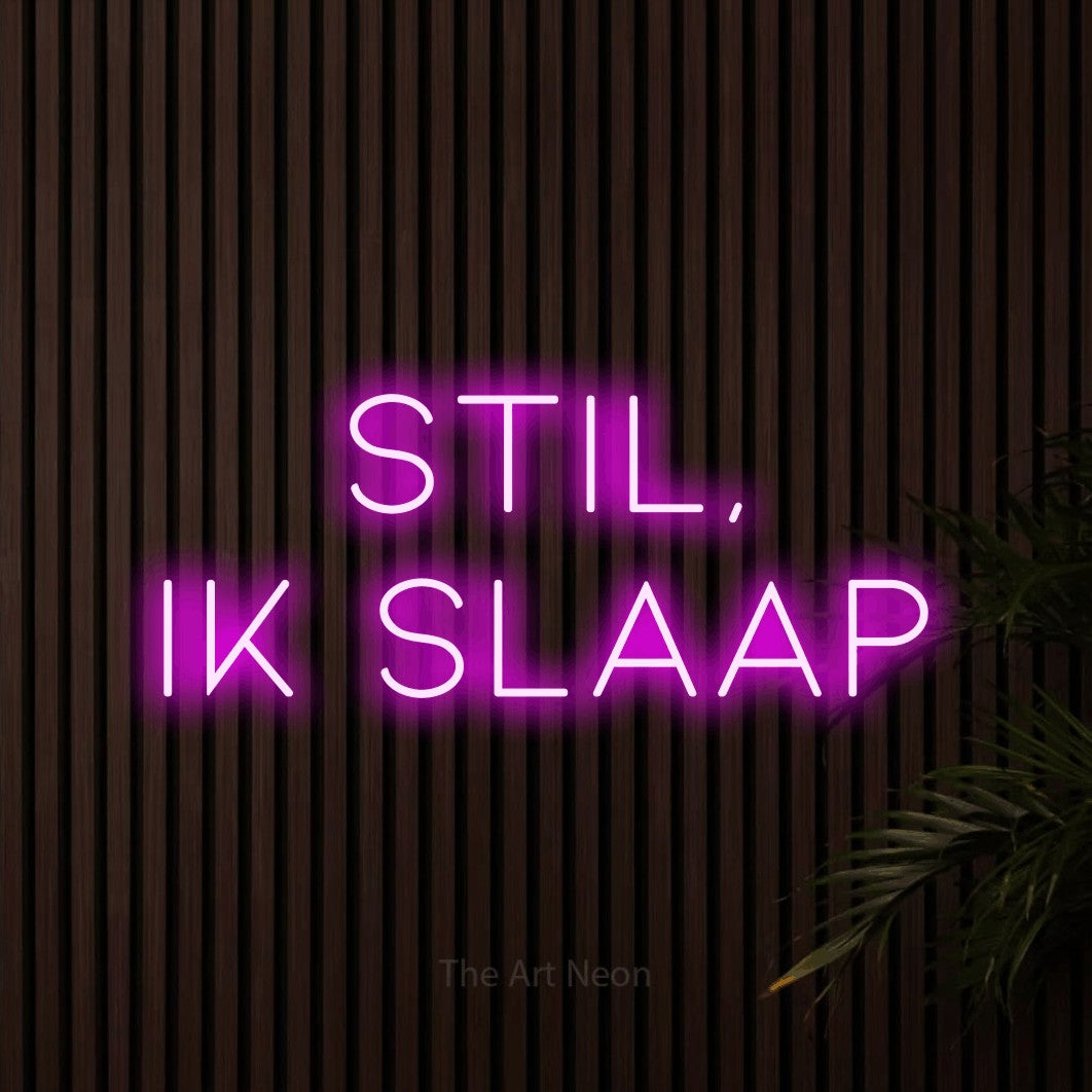 LED neon sign reading “stil, ik slaap”, arranged in 2 lines.