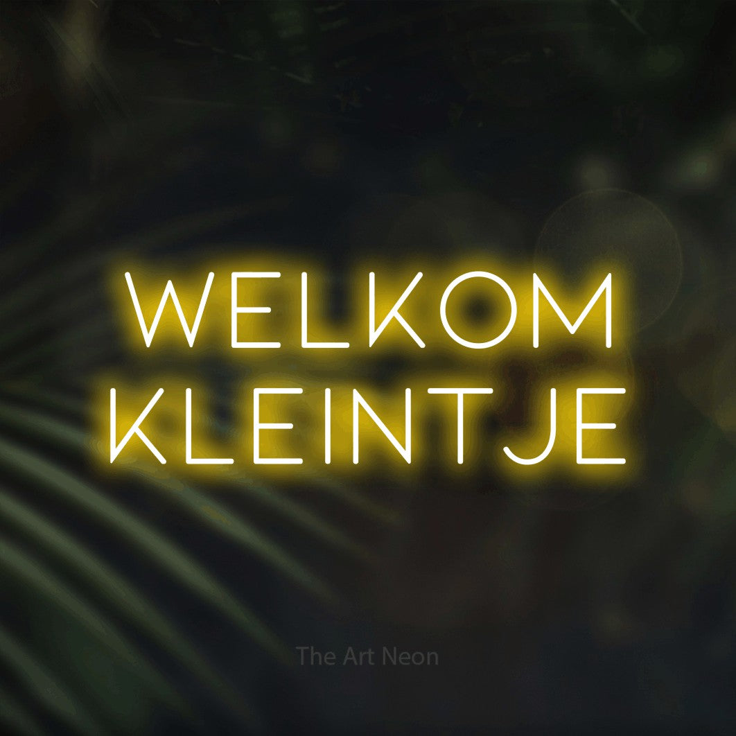 LED neon sign reading “welkom kleintje”, arranged in 2 lines.