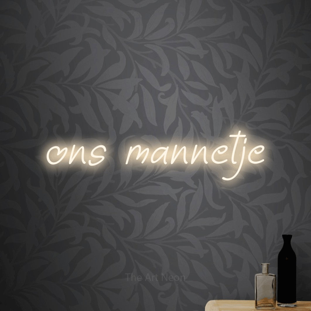 LED neon sign reading “ons mannetje”, arranged in a single line.