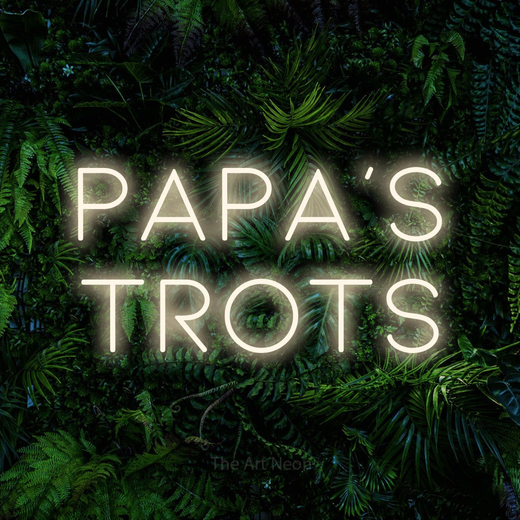 LED neon sign reading “papa's trots”, arranged in 2 lines.