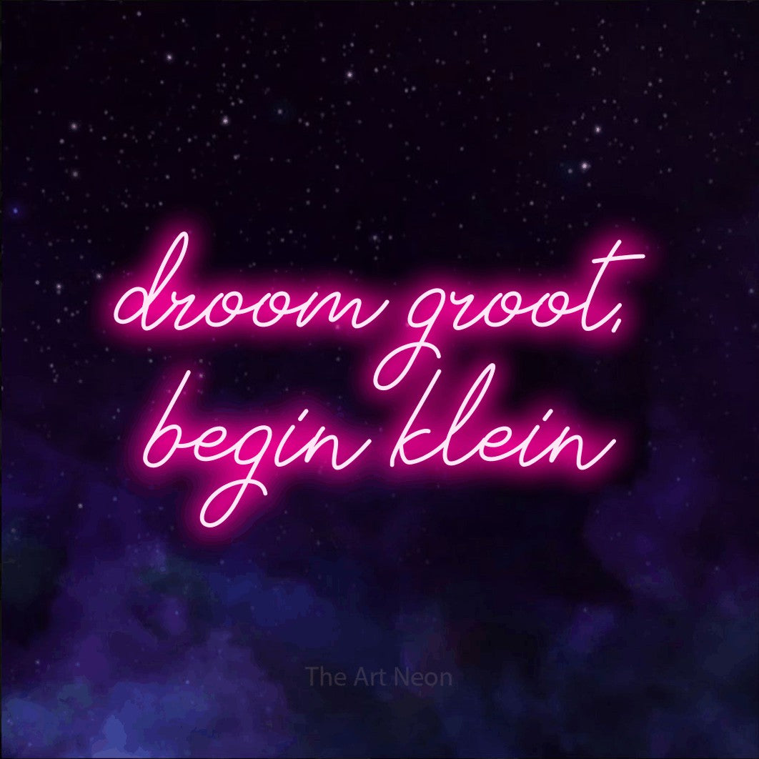 LED neon sign reading “droom groot, begin klein”, arranged in 2 lines.