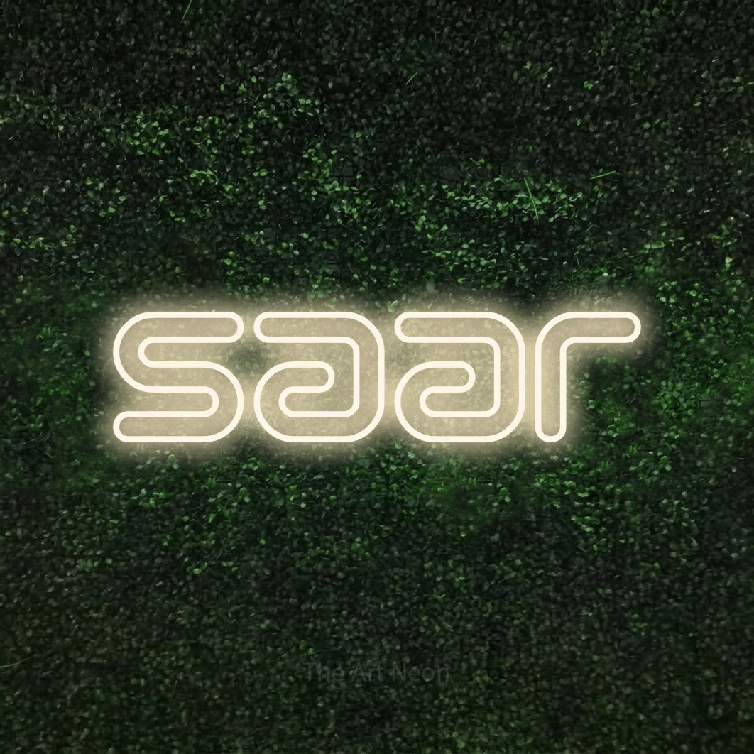 LED neon sign reading “Saar”, arranged in a single line.