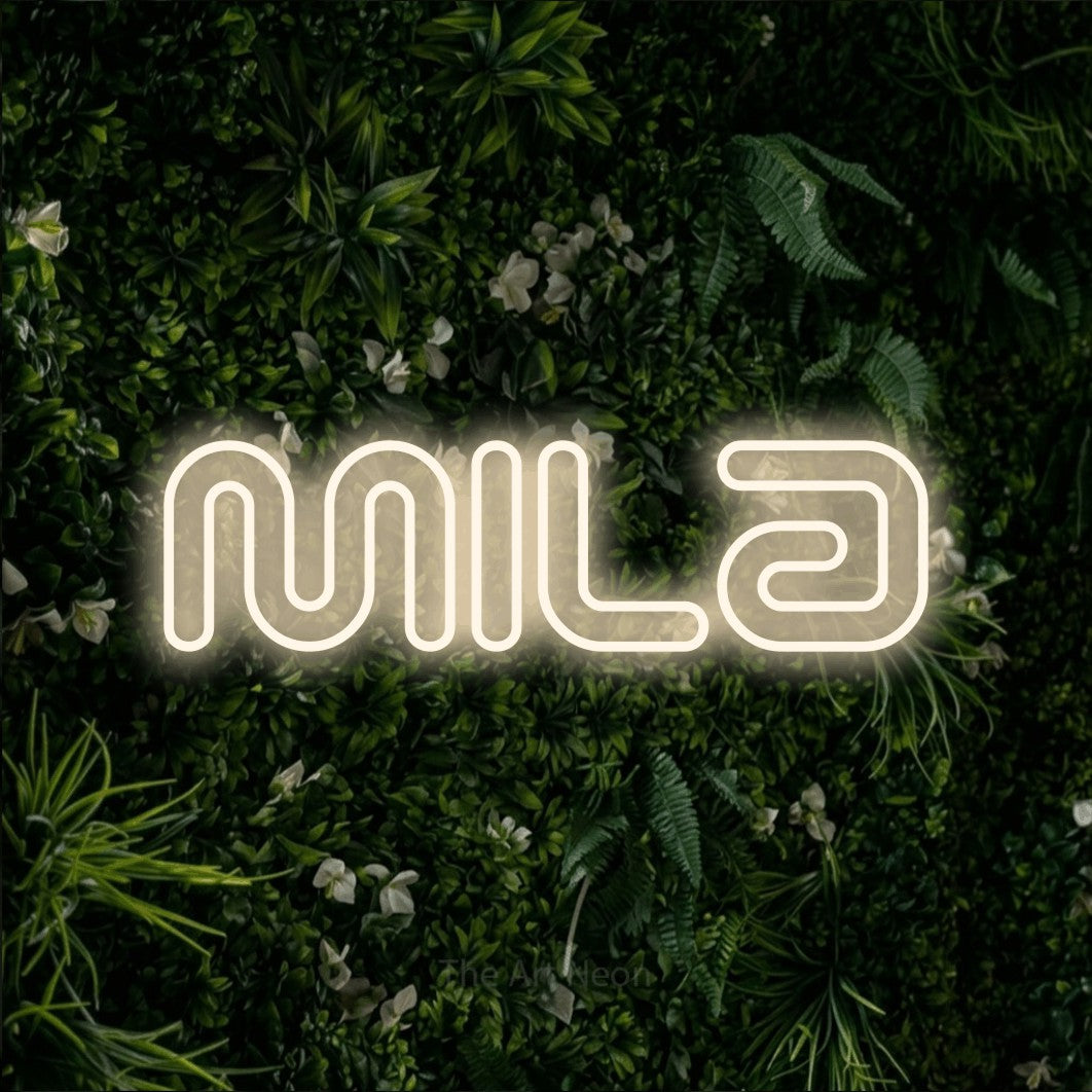 LED neon sign reading “Mila”, arranged in a single line.