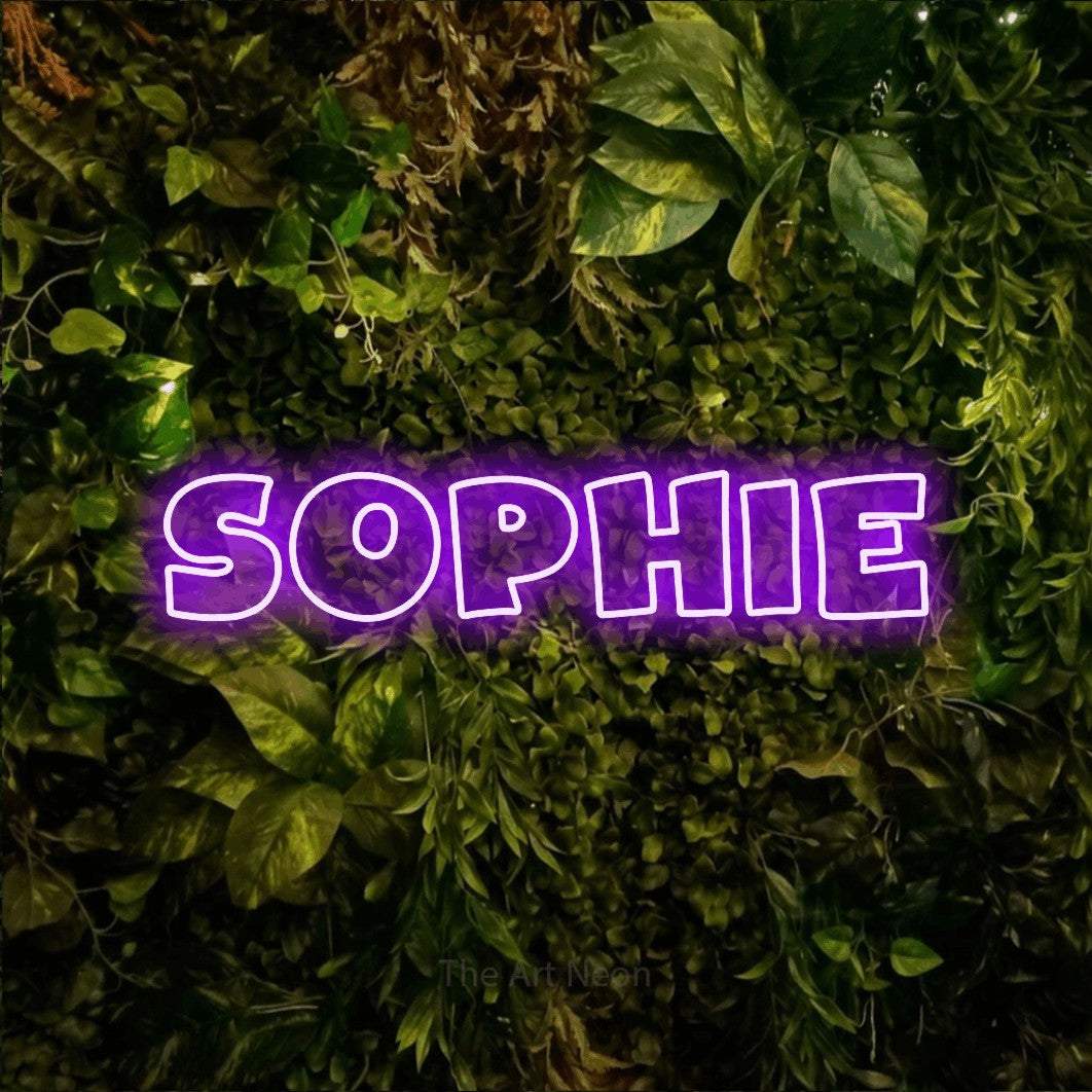 LED neon sign reading “SOPHIE”, arranged in a single line.