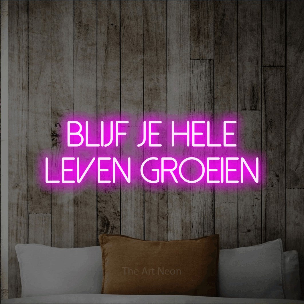 LED neon sign reading “blijf je hele leven groeien”, arranged in 2 lines.