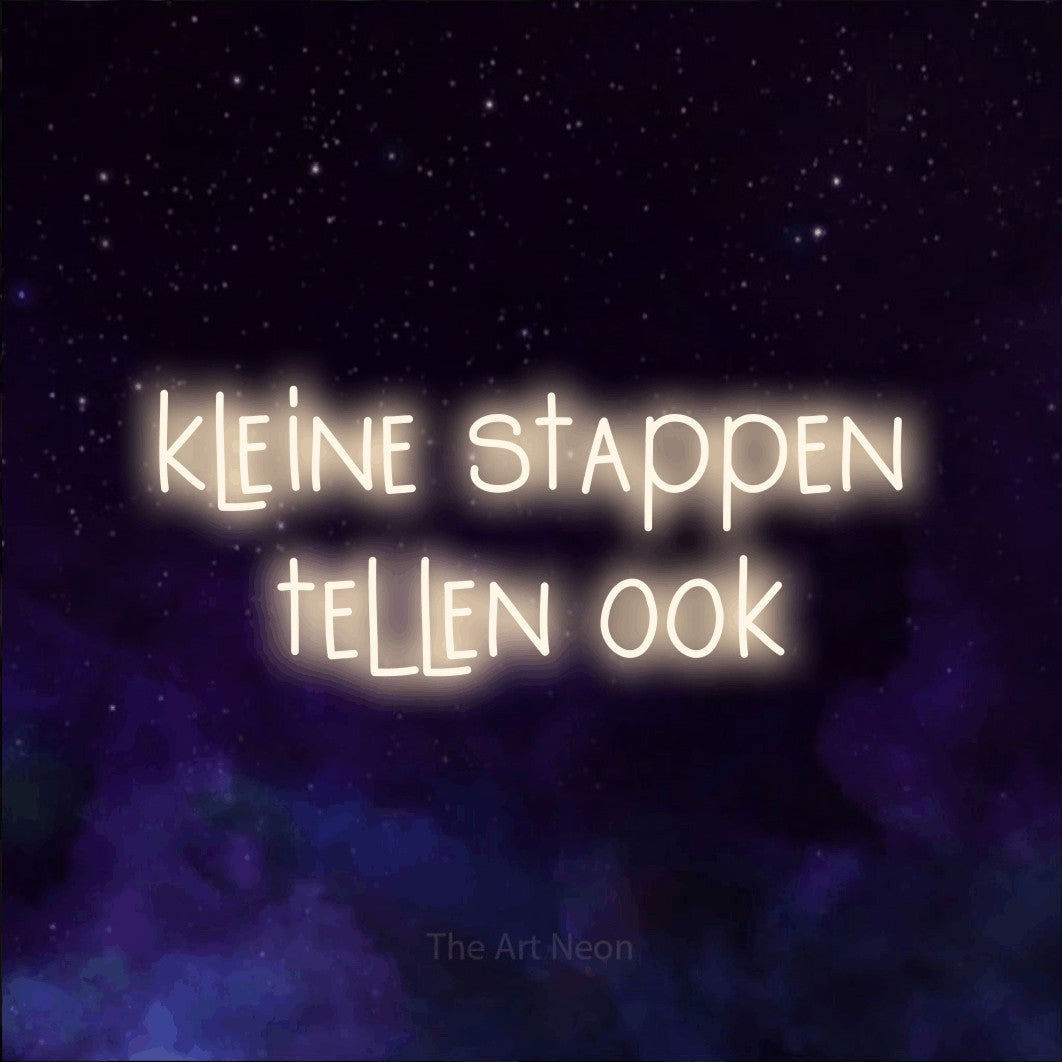 LED neon sign reading “kleine stappen tellen ook”, arranged in 2 lines.