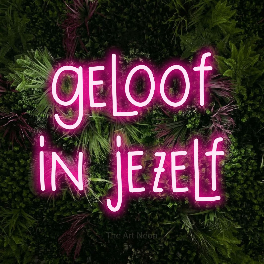 LED neon sign reading “geloof in jezelf”, arranged in 2 lines.