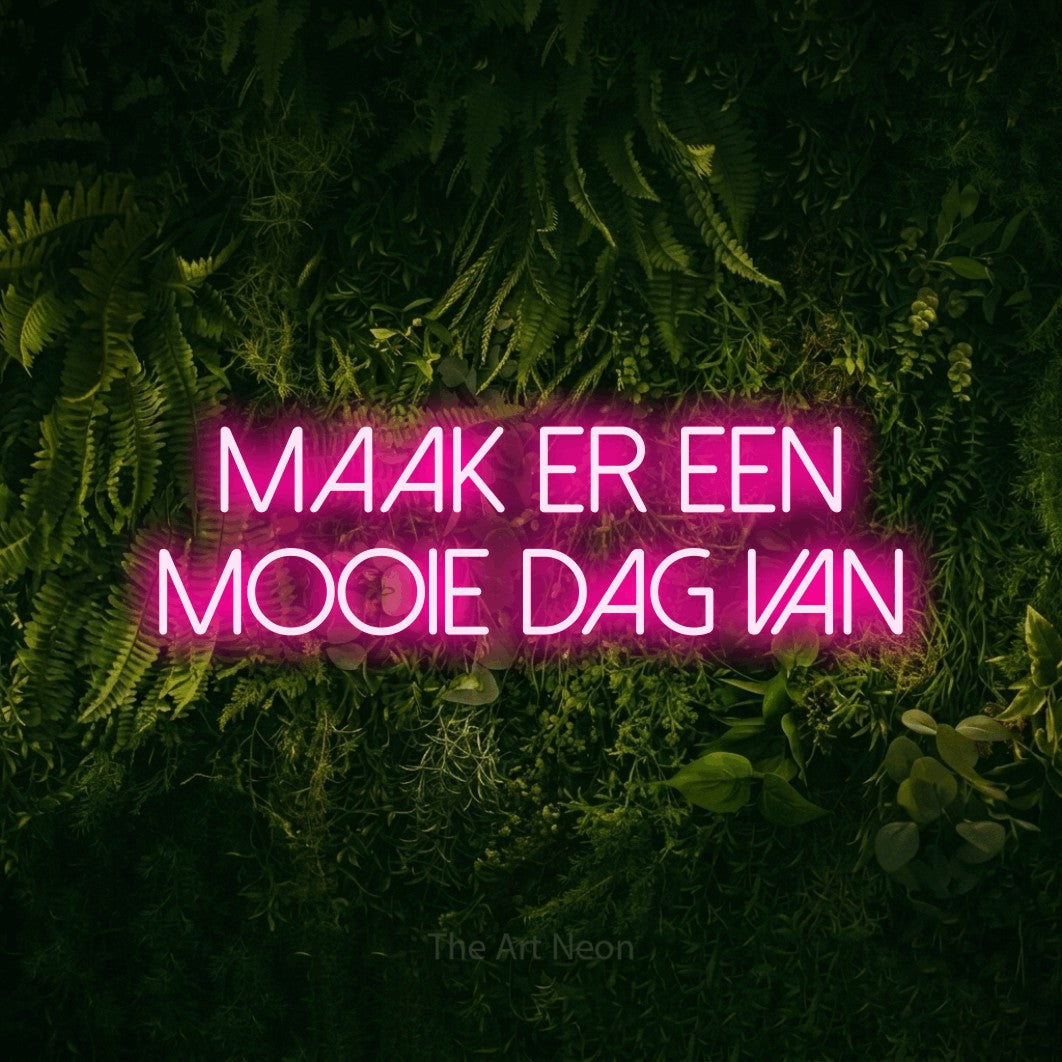 LED neon sign reading “MAAK ER EEN MOOIE DAG VAN”, arranged in 2 lines.
