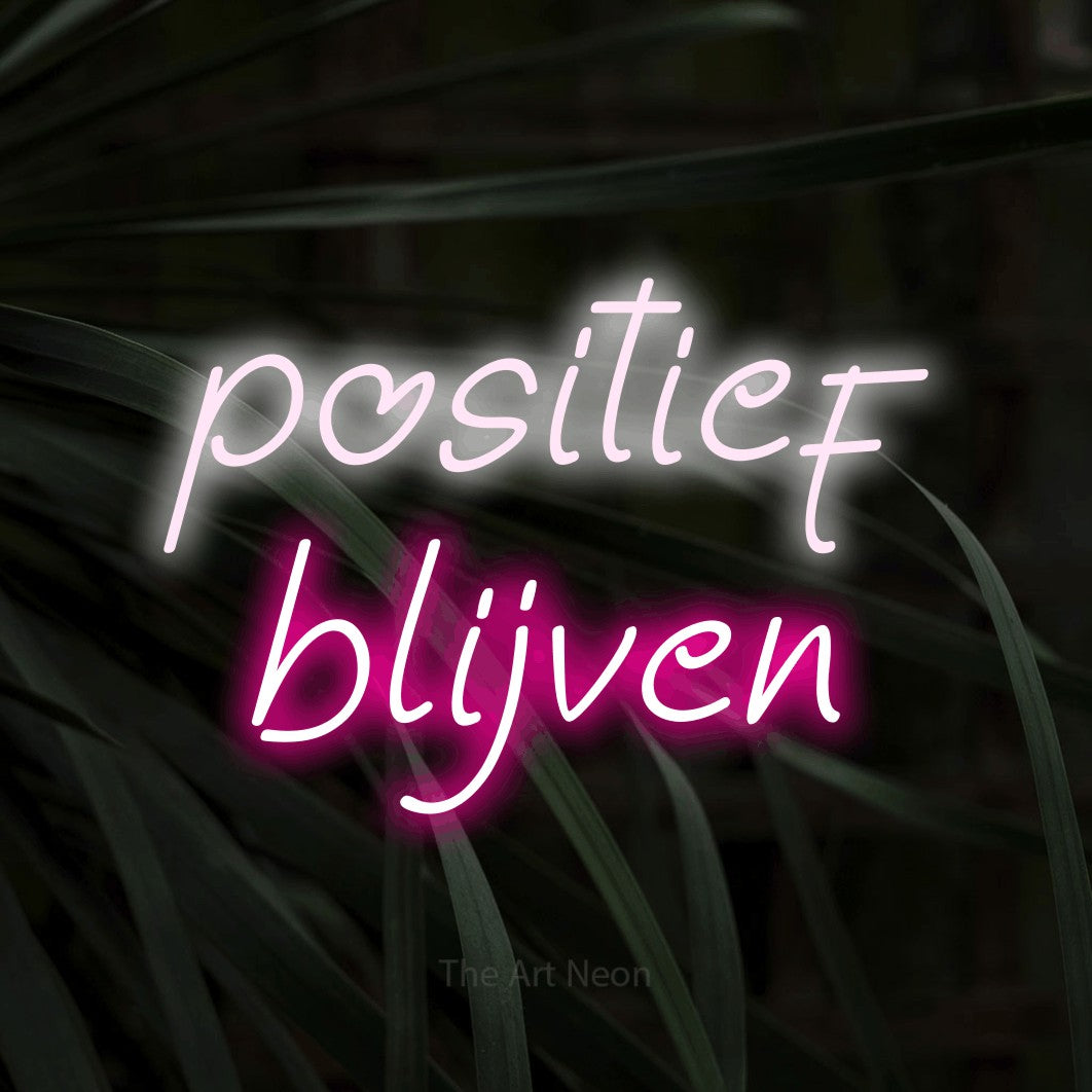 LED neon sign reading “positief blijven”, arranged in 2 lines.