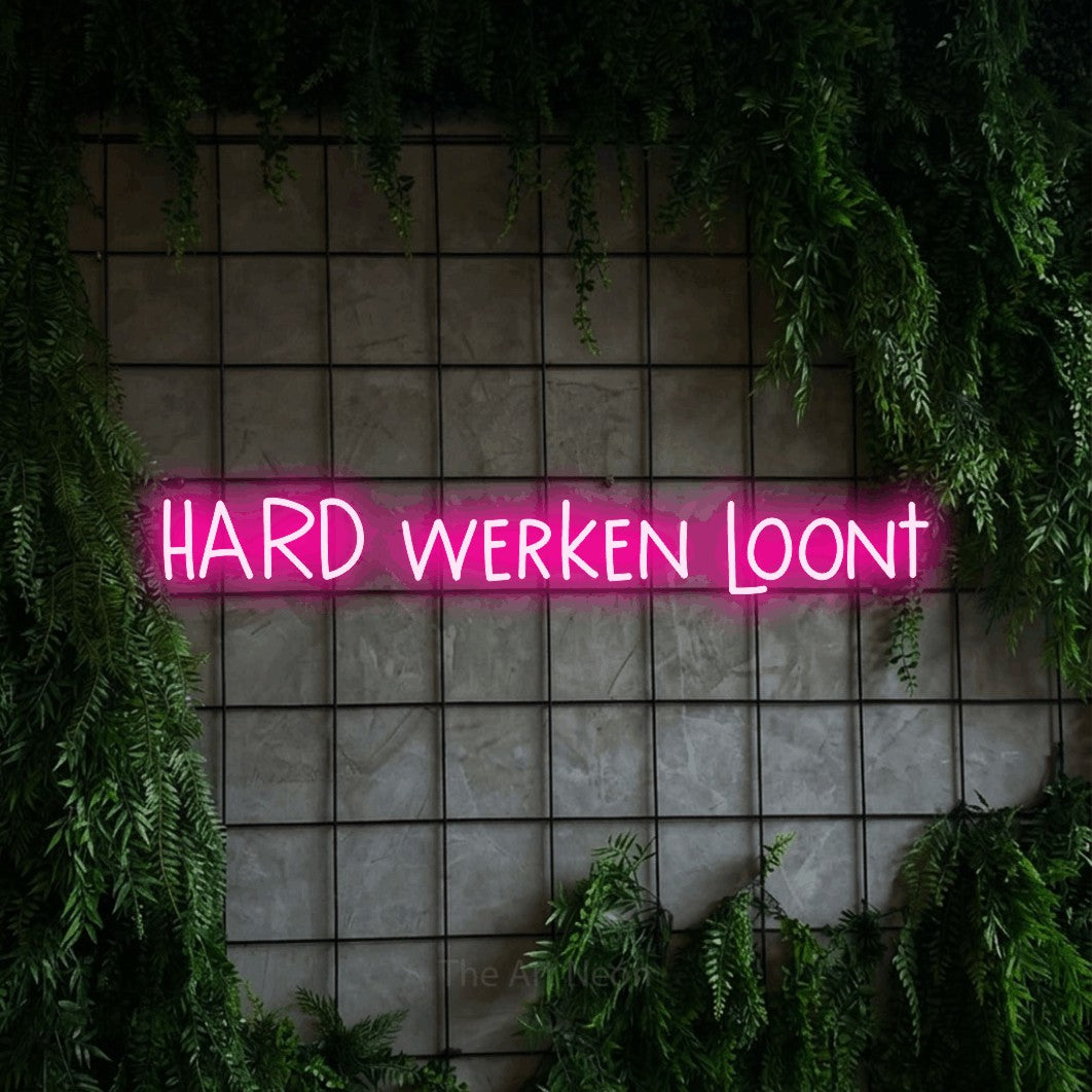 LED neon sign reading “HARD werken loont”, arranged in a single line.