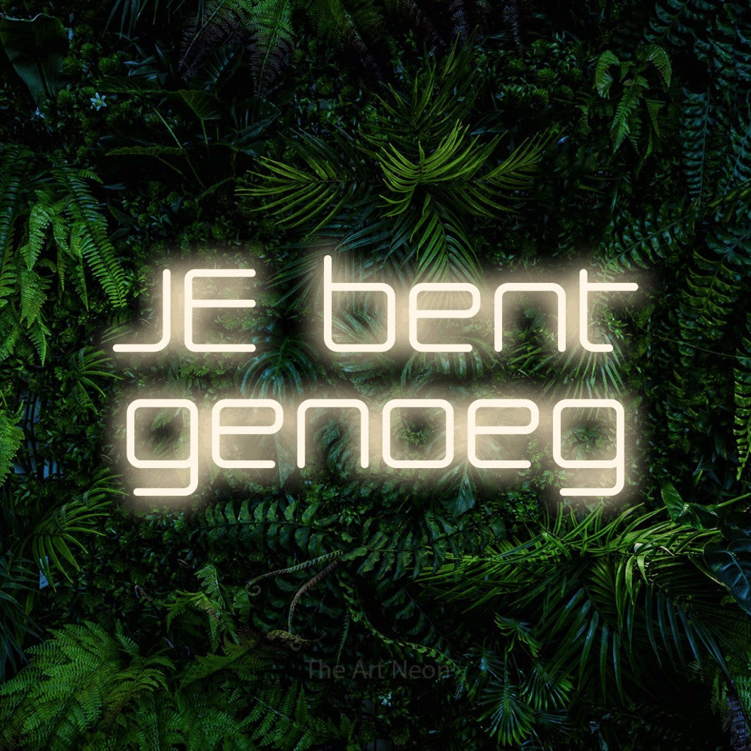 LED neon sign reading “JE bent genoeg”, arranged in 2 lines.