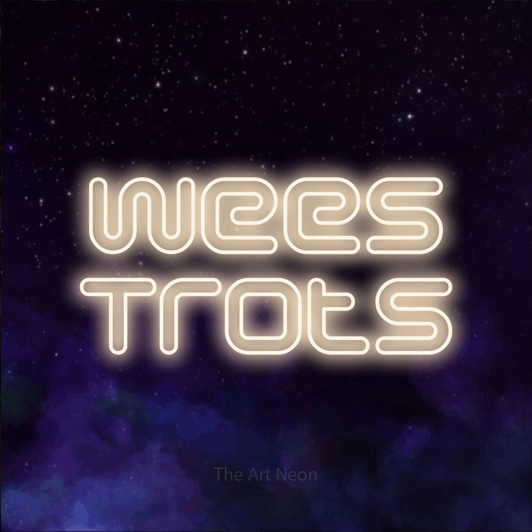 LED neon sign reading “Wees Trots”, arranged in 2 lines.