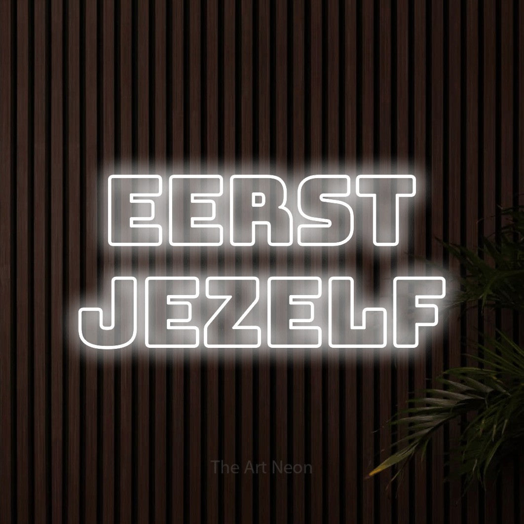 LED neon sign reading “eerst jezelf”, arranged in 2 lines.