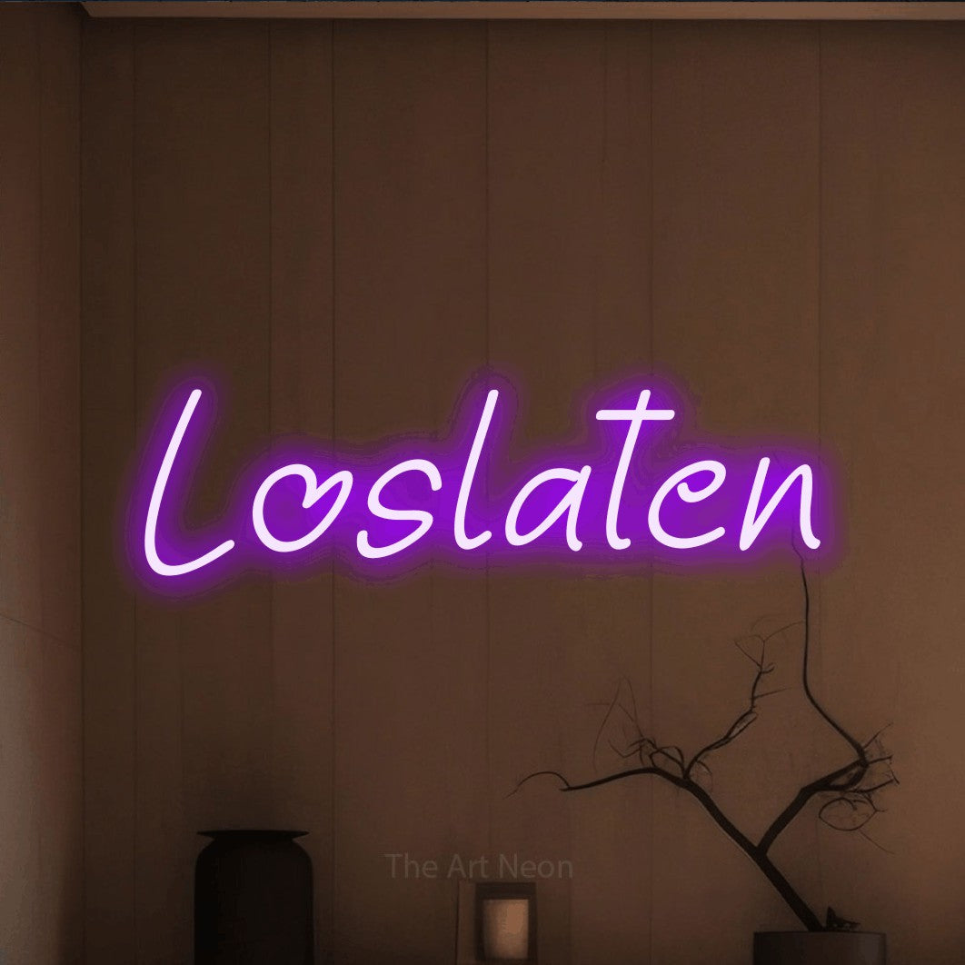 LED neon sign reading “Loslaten”, arranged in a single line.