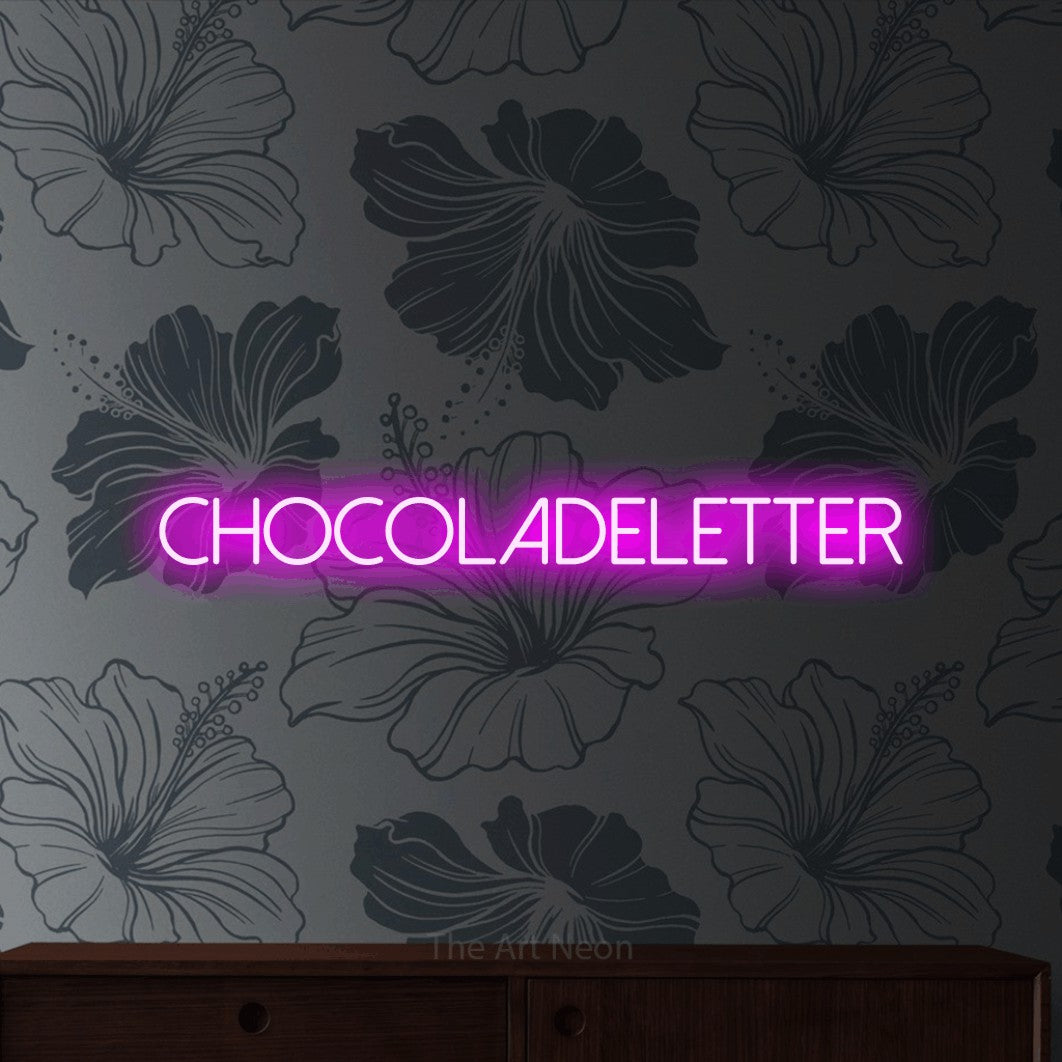 LED neon sign reading “Chocoladeletter”, arranged in a single line.