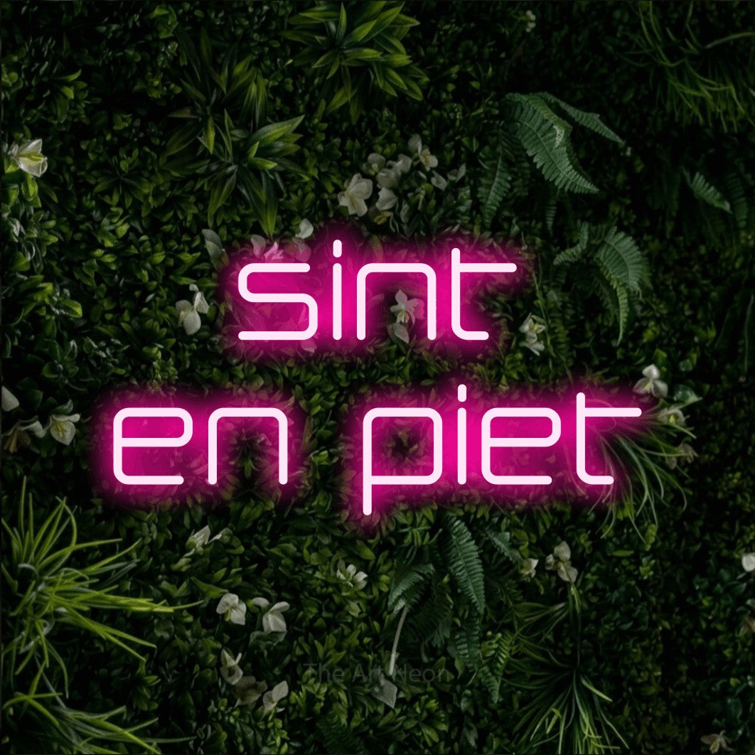LED neon sign reading “sint en piet”, arranged in 2 lines.