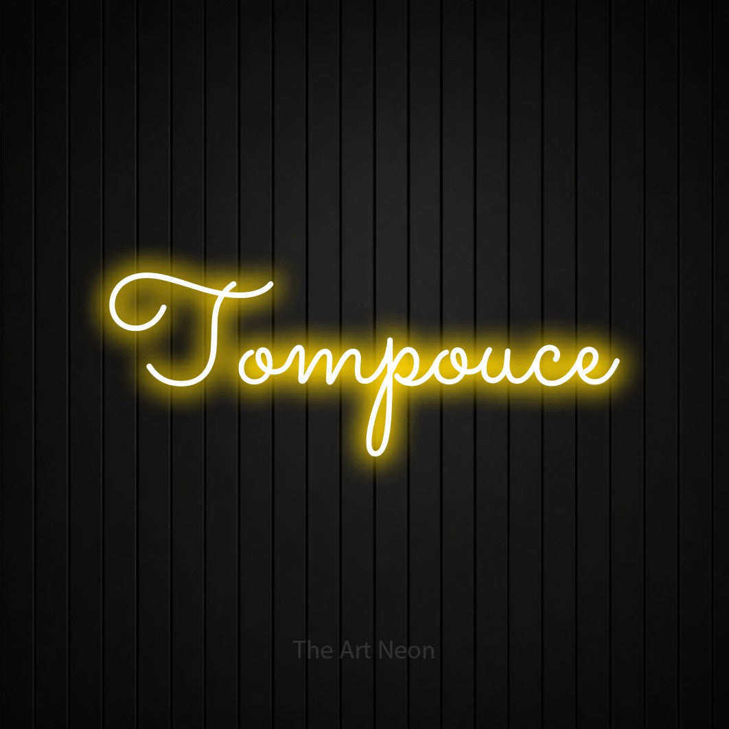 LED neon sign reading “Tompouce”, arranged in a single line.