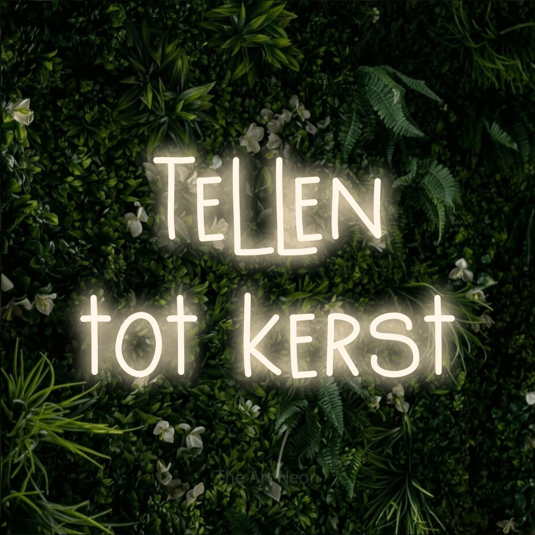 LED neon sign reading “Tellen tot kerst”, arranged in 2 lines.