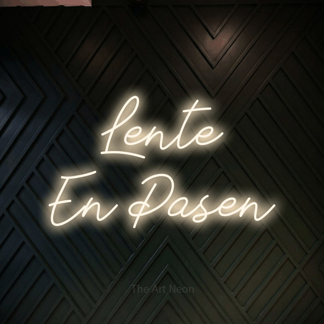 LED neon sign reading “Lente En Pasen”, arranged in 2 lines.