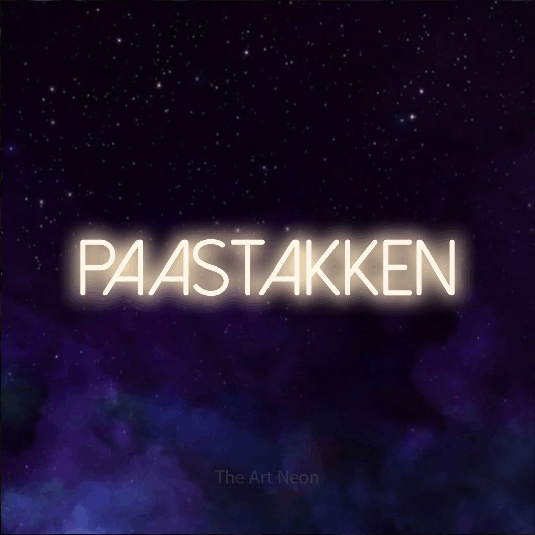 LED neon sign reading “Paastakken”, arranged in a single line.