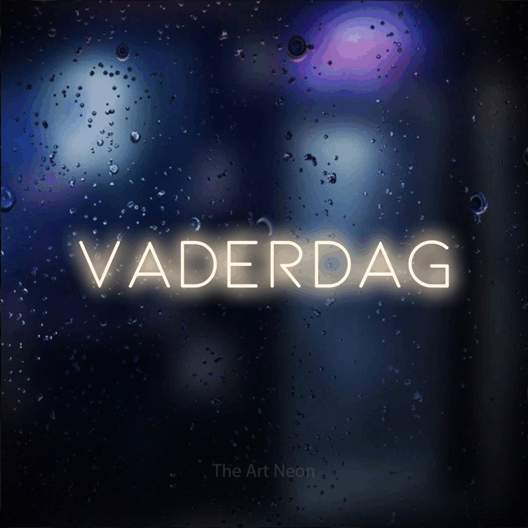 LED neon sign reading “VADERDAG”, arranged in a single line.
