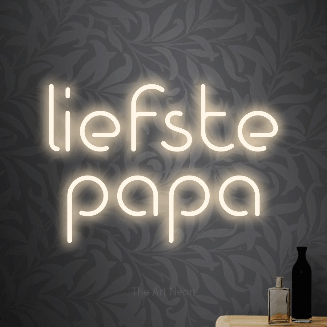 LED neon sign reading “liefste papa”, arranged in 2 lines.