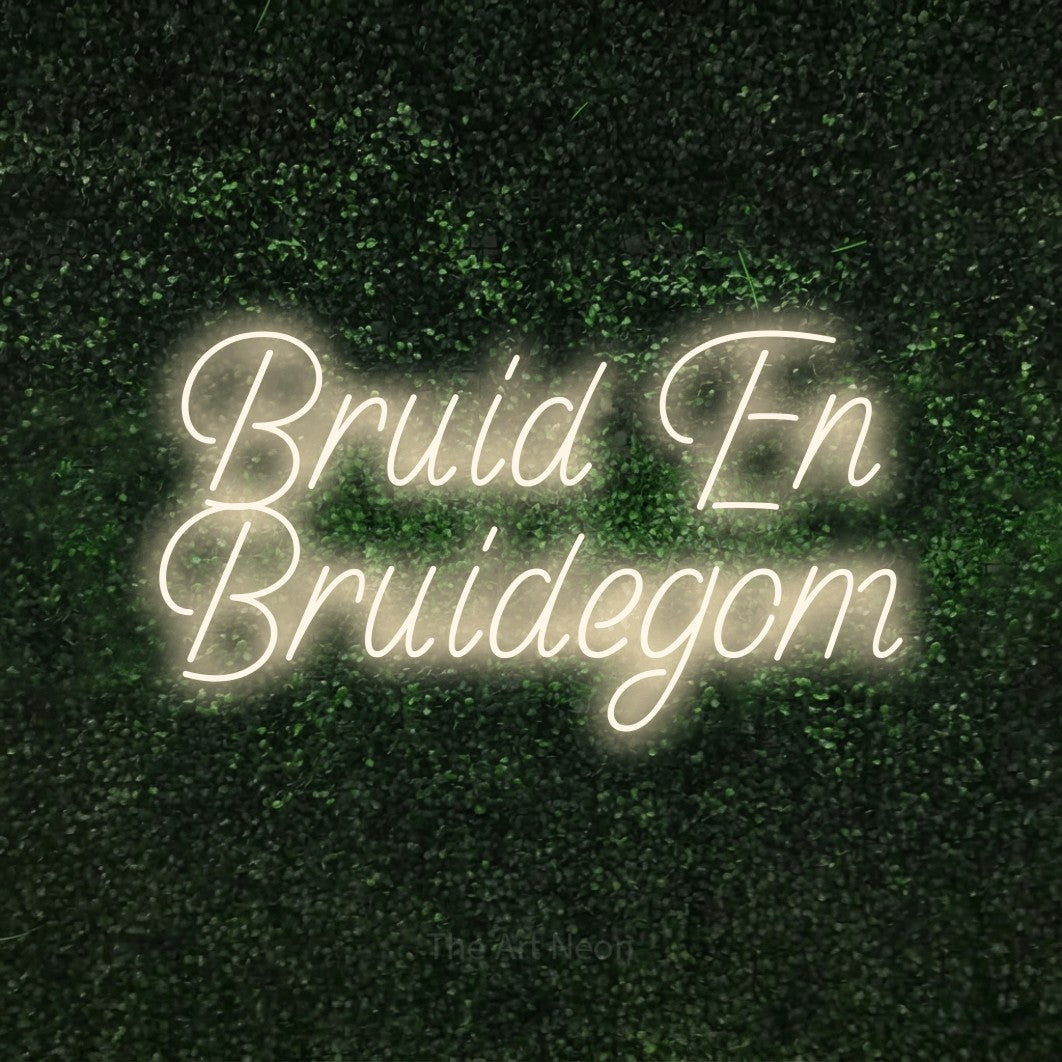 LED neon sign reading “Bruid En Bruidegom”, arranged in 2 lines.