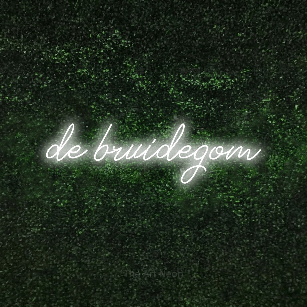 LED neon sign reading “de bruidegom”, arranged in a single line.
