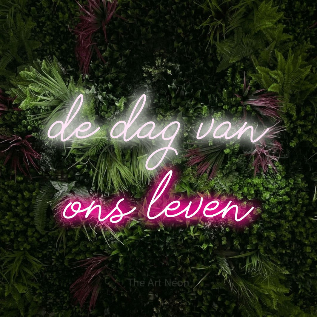 LED neon sign reading “de dag van ons leven”, arranged in 2 lines.