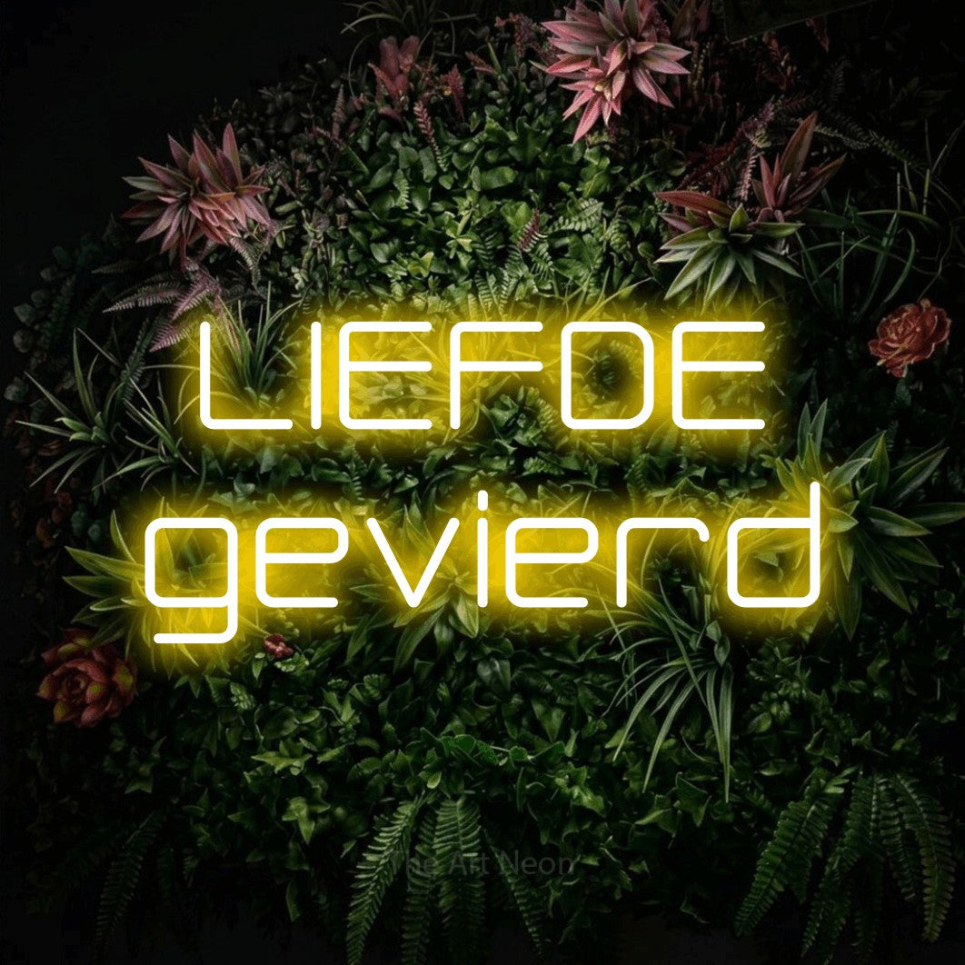 LED neon sign reading “LIEFDE gevierd”, arranged in 2 lines.