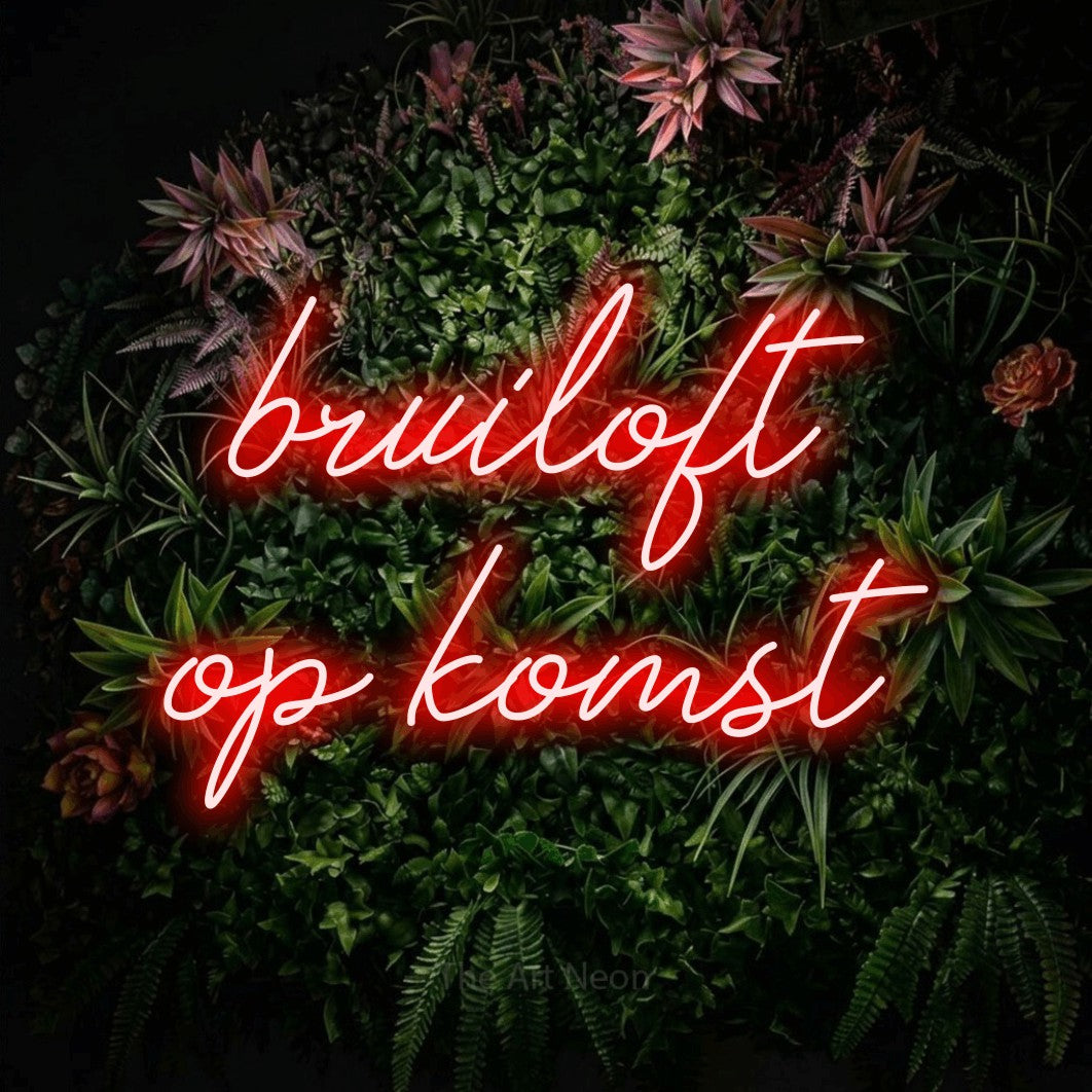 LED neon sign reading “bruiloft op komst”, arranged in 2 lines.
