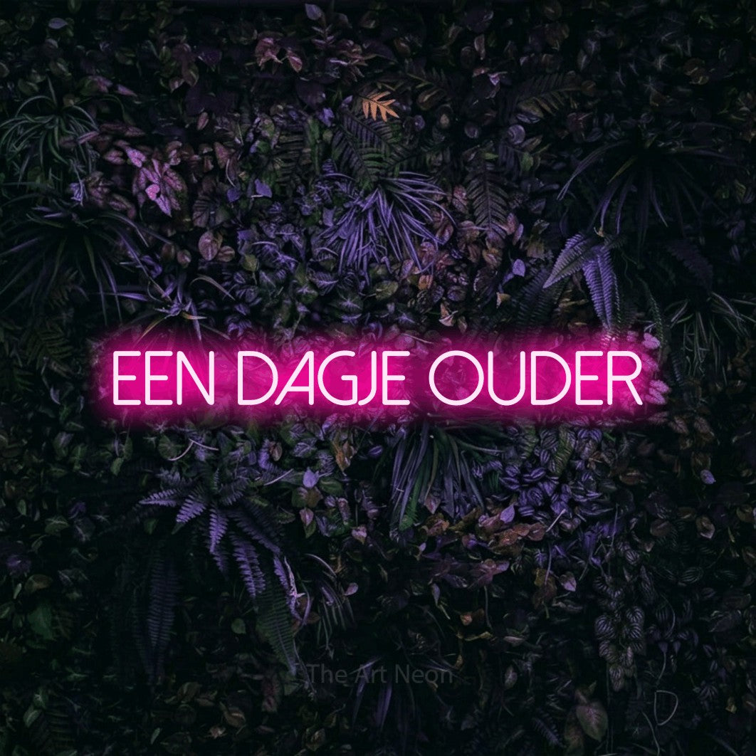 LED neon sign reading “Een Dagje Ouder”, arranged in a single line.