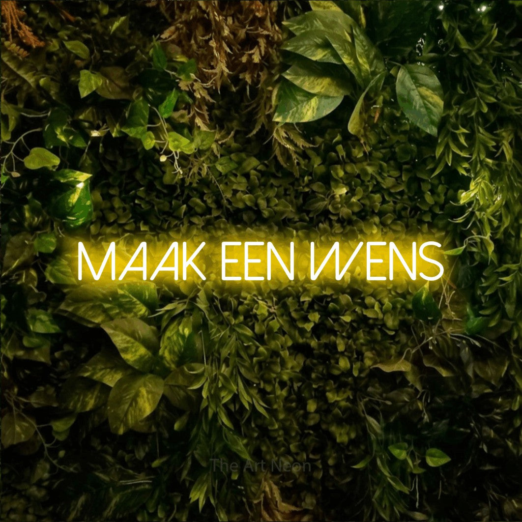 LED neon sign reading “Maak Een Wens”, arranged in a single line.