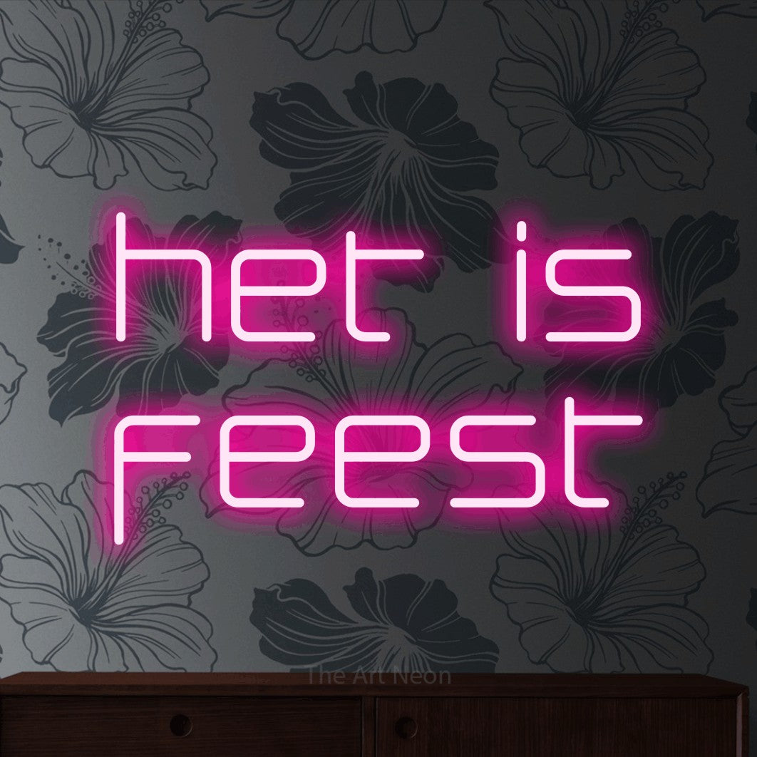 LED neon sign reading “het is feest”, arranged in 2 lines.