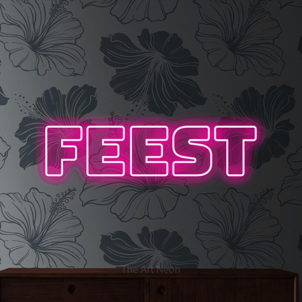 LED neon sign reading “FEEST”, arranged in a single line.