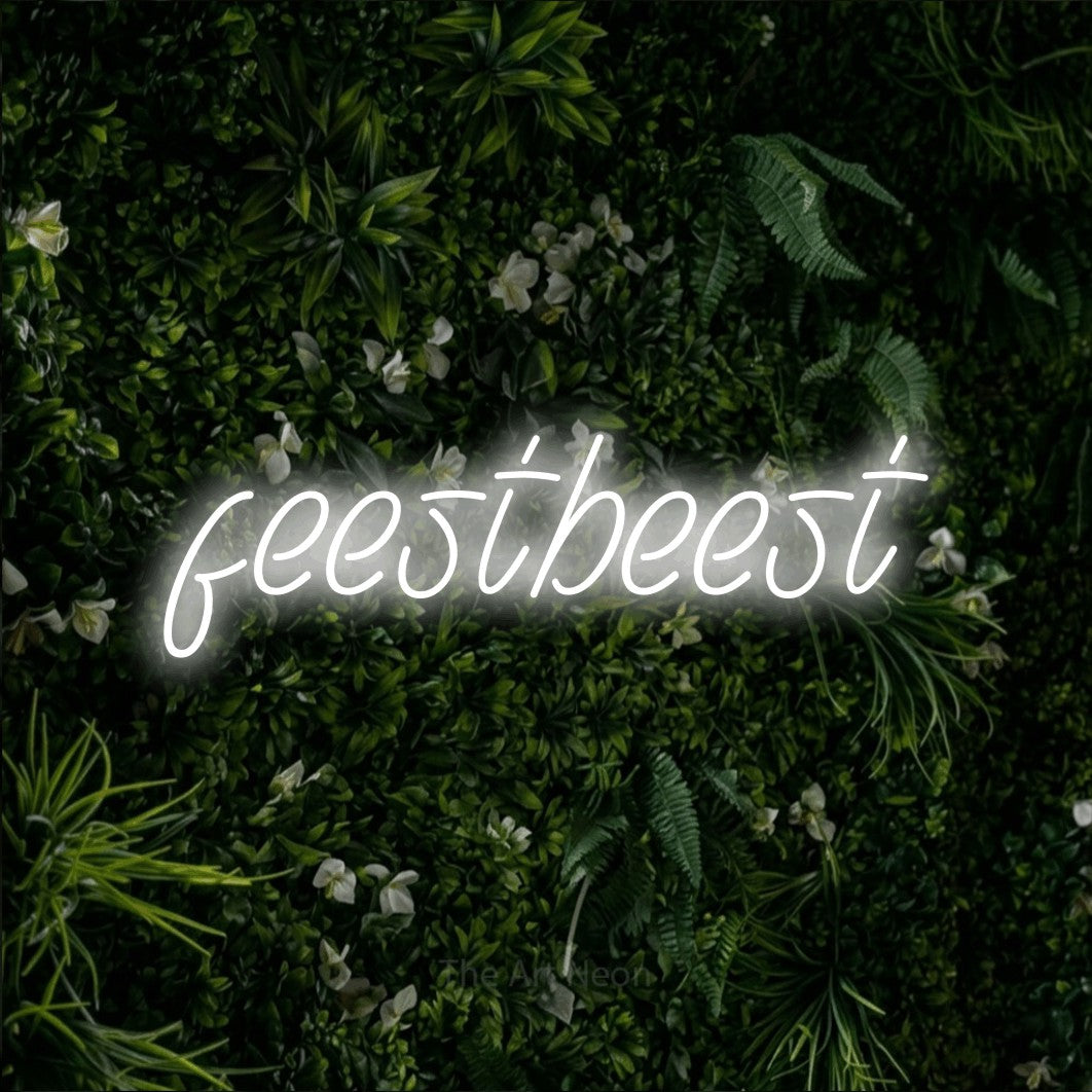LED neon sign reading “feestbeest”, arranged in a single line.