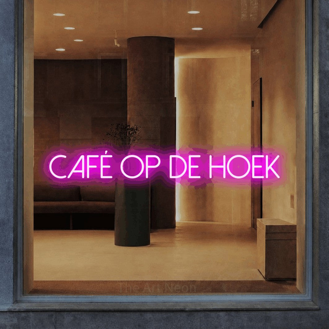 LED neon sign reading “café op de hoek”, arranged in a single line.