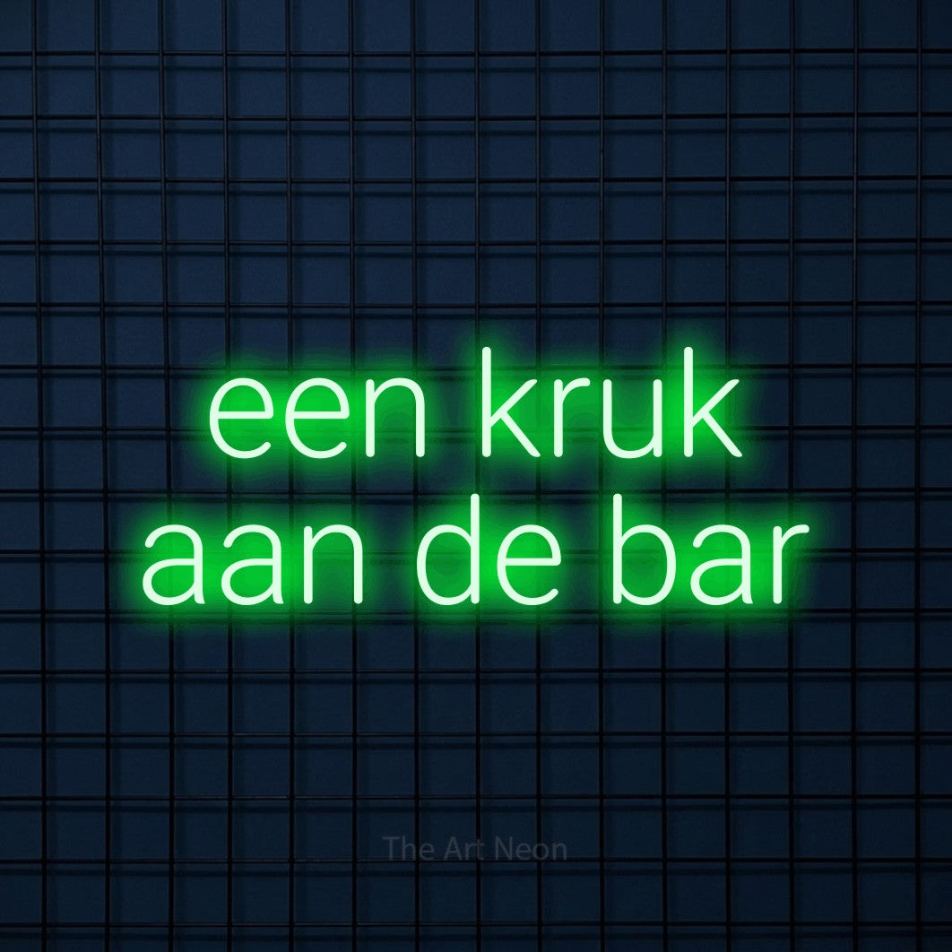LED neon sign reading “een kruk aan de bar”, arranged in 2 lines.